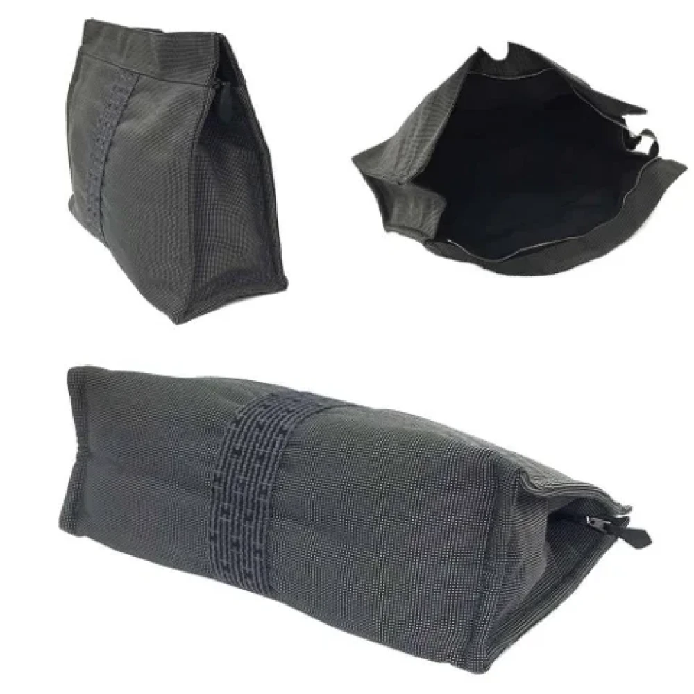 Hermès Vintage Pre-owned Fabric clutches Gray Dames