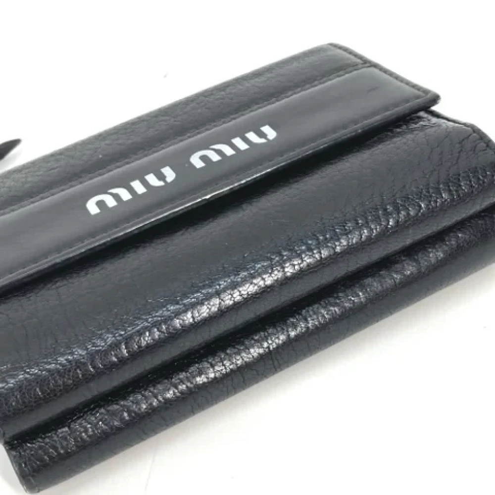 Miu Pre-owned Leather wallets Black Dames