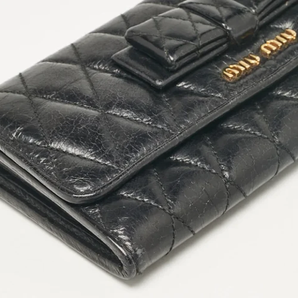 Miu Pre-owned Leather wallets Black Dames