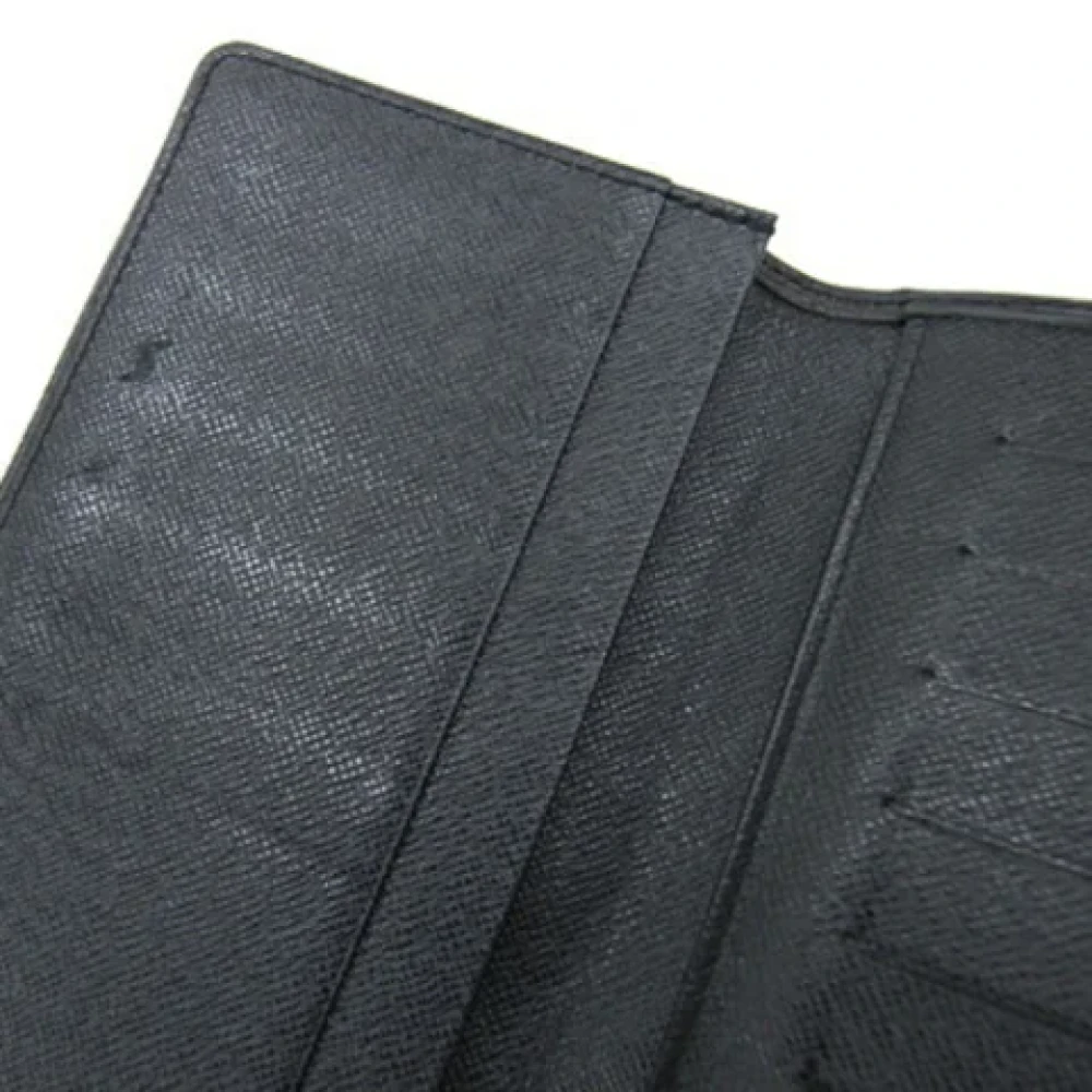 Louis Vuitton Vintage Pre-owned Leather wallets Black Heren