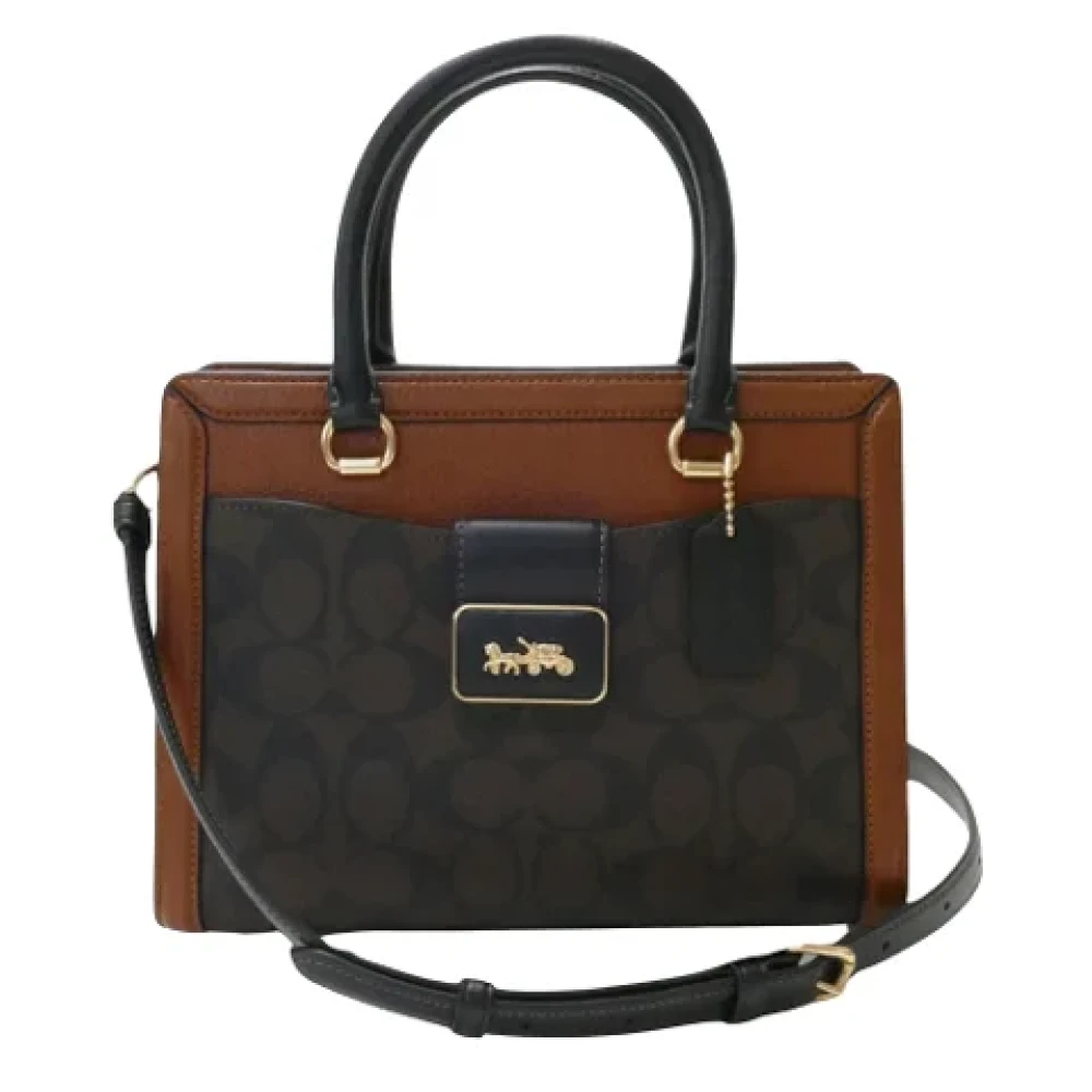 Coach Pre-owned Fabric handbags Brown Dames