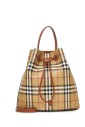 leather-drawstring-bag-with-shield-shaped-stopper