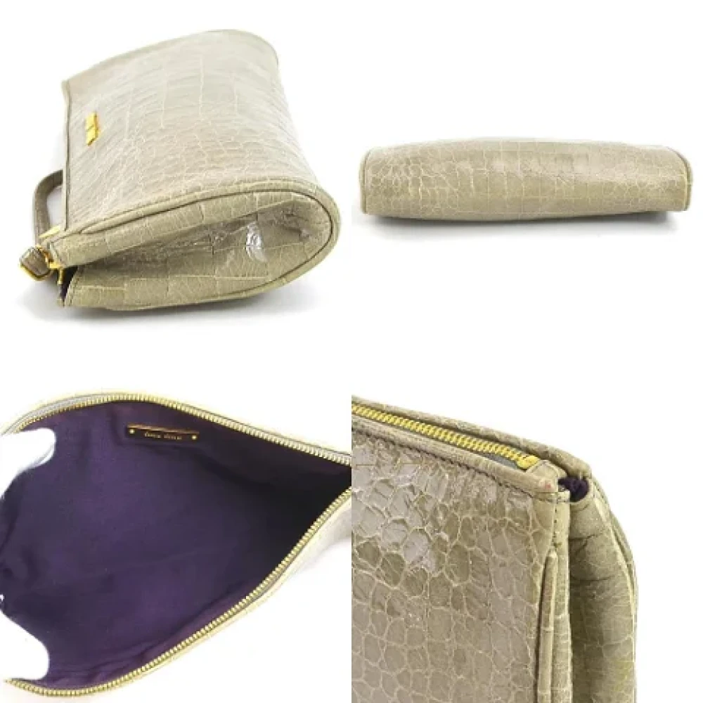Miu Pre-owned Fabric clutches Beige Dames