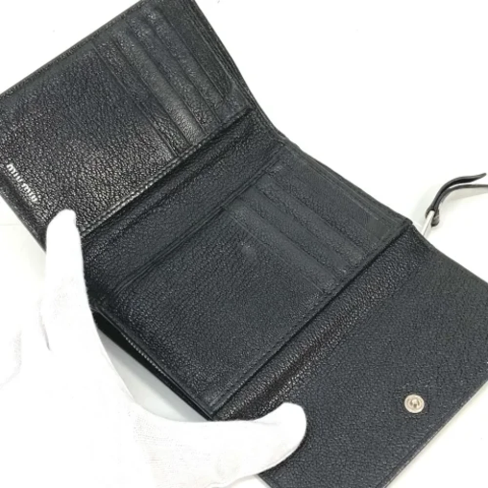 Miu Pre-owned Leather wallets Black Dames