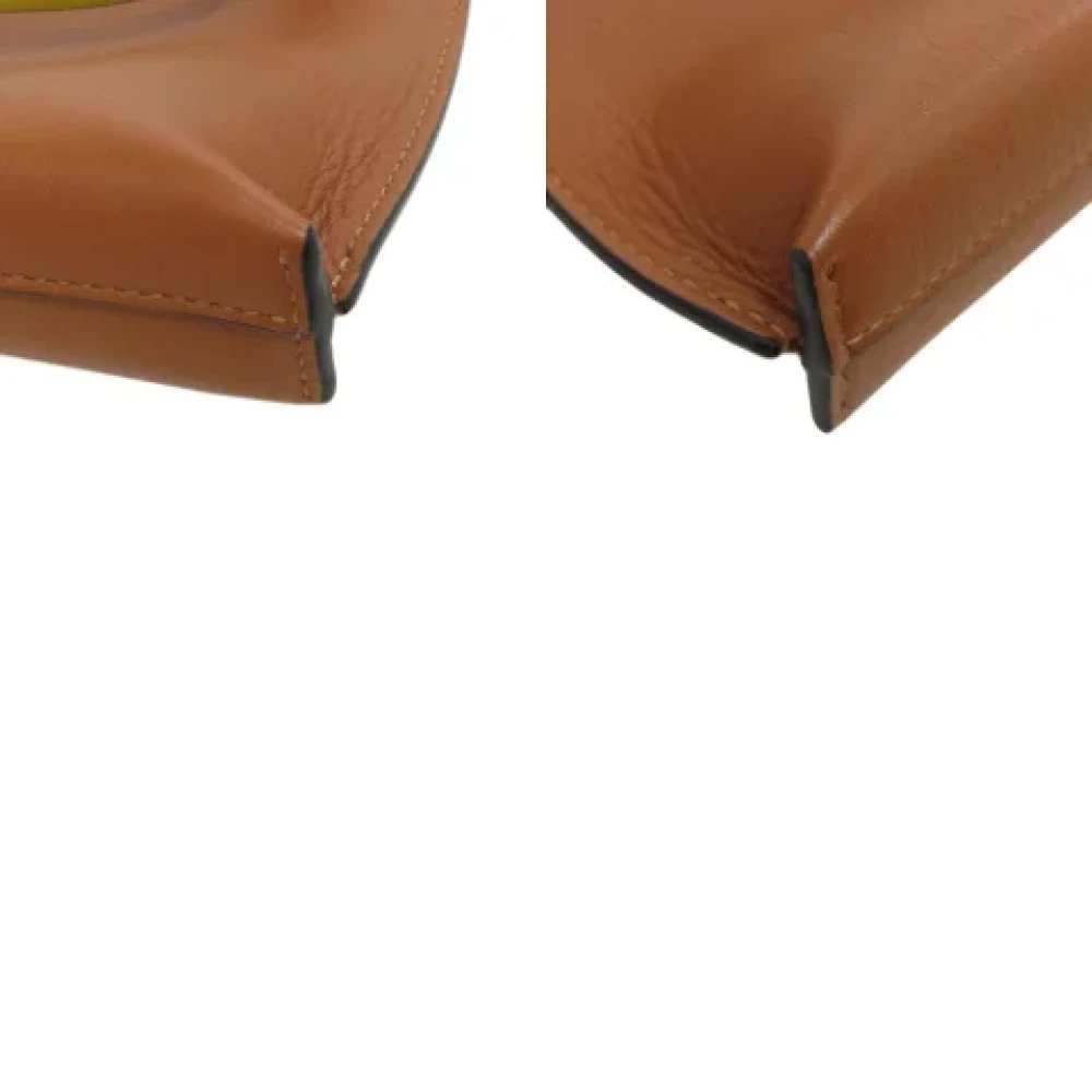Loewe Pre-owned Leather pouches Brown Dames