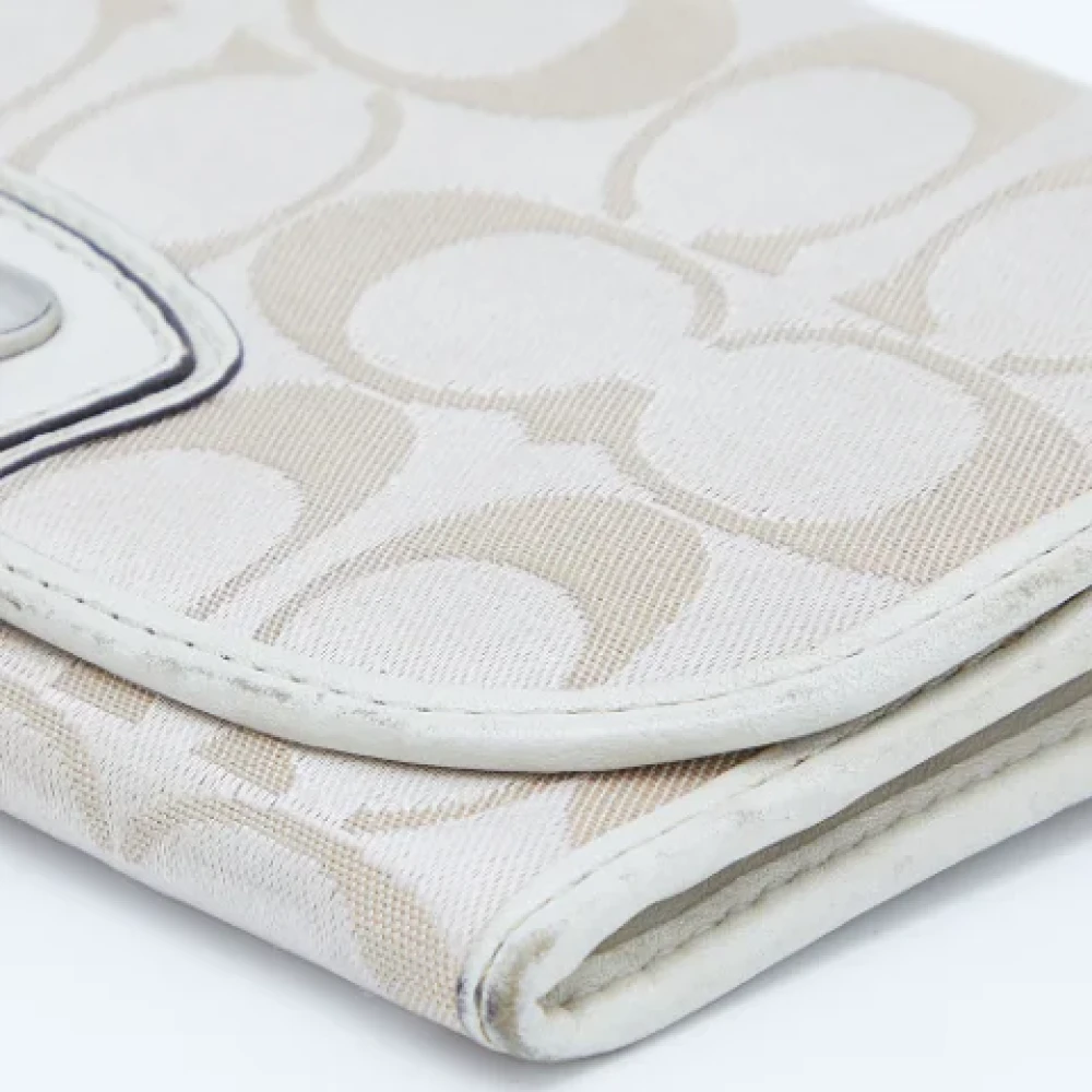 Coach Pre-owned Canvas wallets Beige Dames