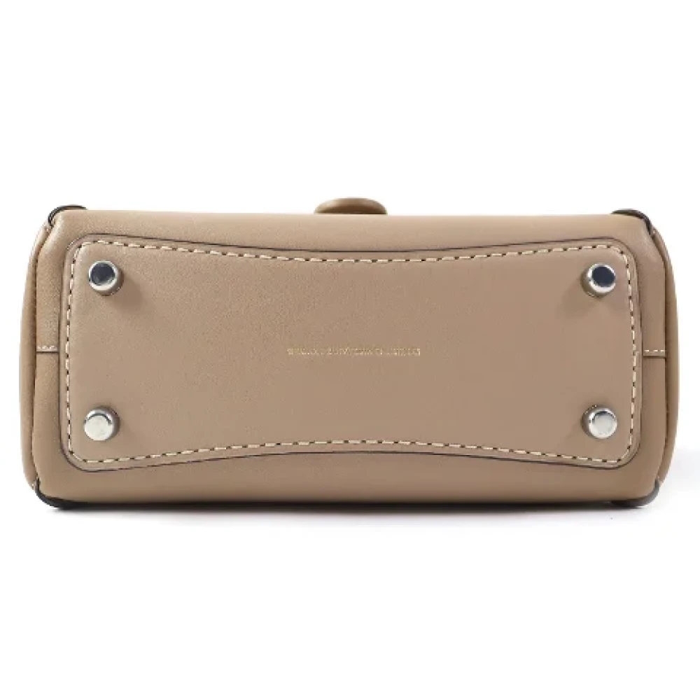 Coach Pre-owned Leather handbags Beige Dames