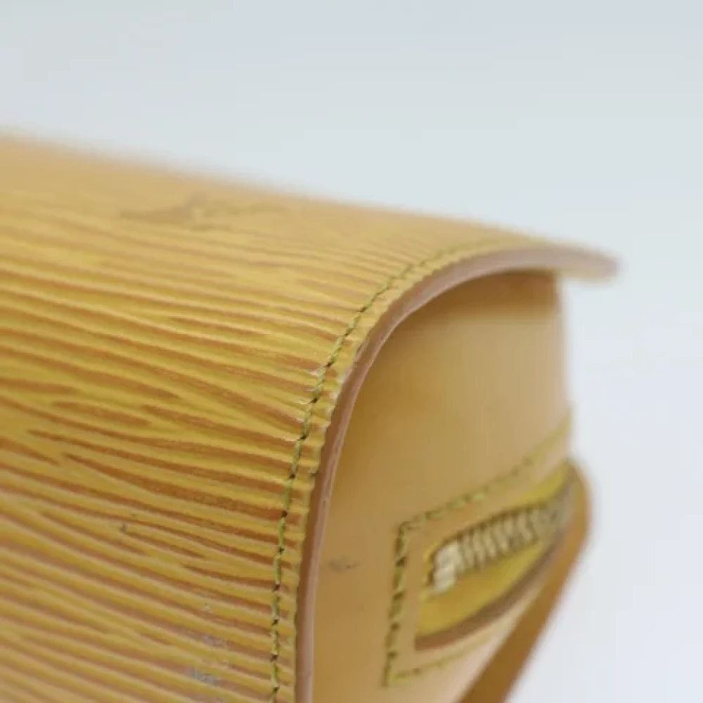 Louis Vuitton Vintage Pre-owned Leather pouches Yellow Dames