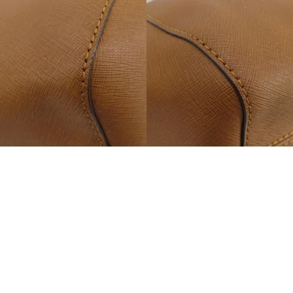 Michael Kors Pre-owned Canvas shoulder-bags Brown Dames