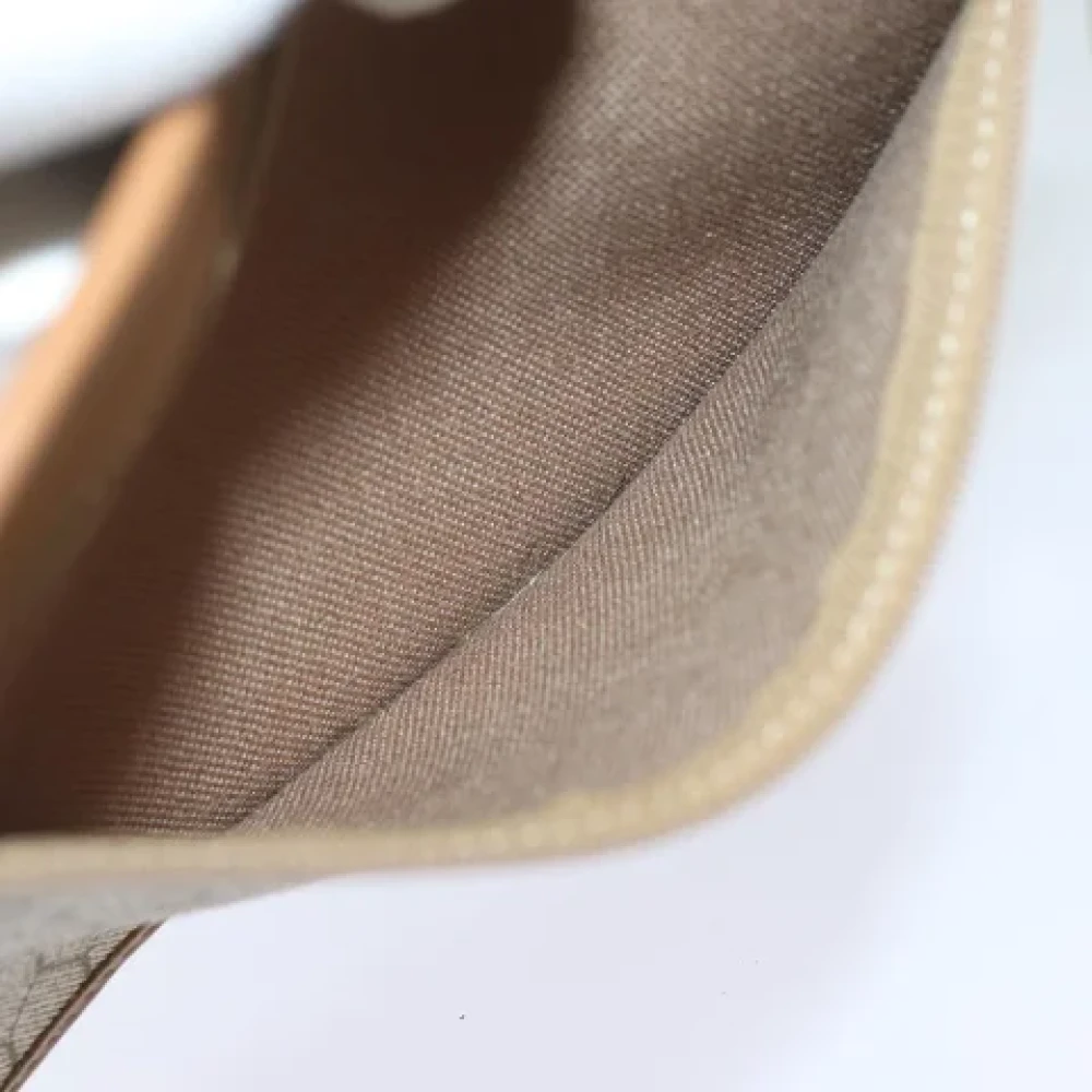 Dior Vintage Pre-owned Canvas clutches Beige Dames