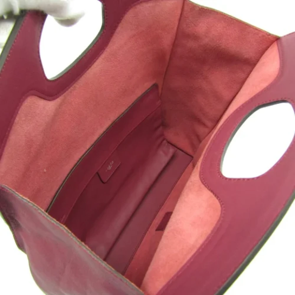 Loewe Pre-owned Leather clutches Red Dames