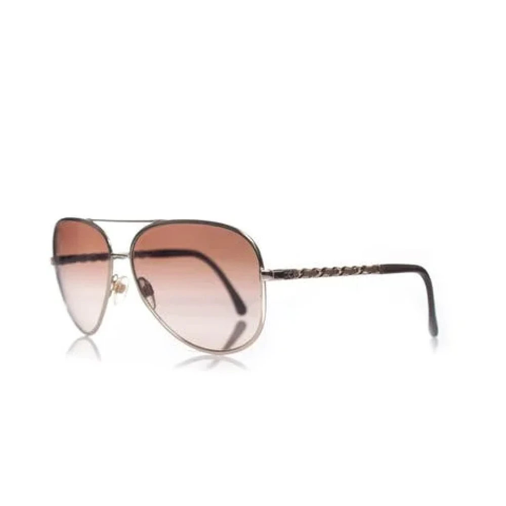 Chanel Vintage Pre-owned Metal sunglasses Brown Heren