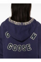 blue-sweater-with-gold-accents