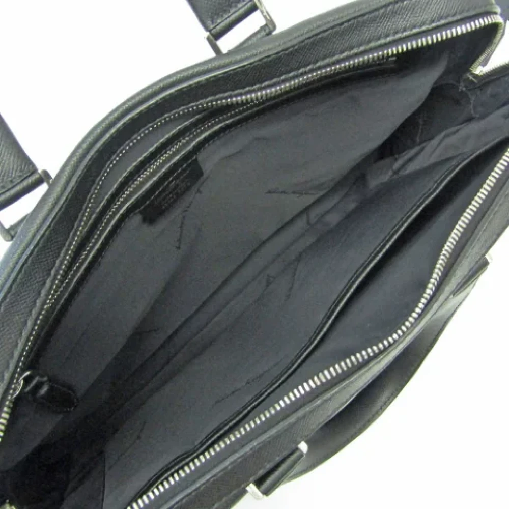 Salvatore Ferragamo Pre-owned Leather handbags Black Heren