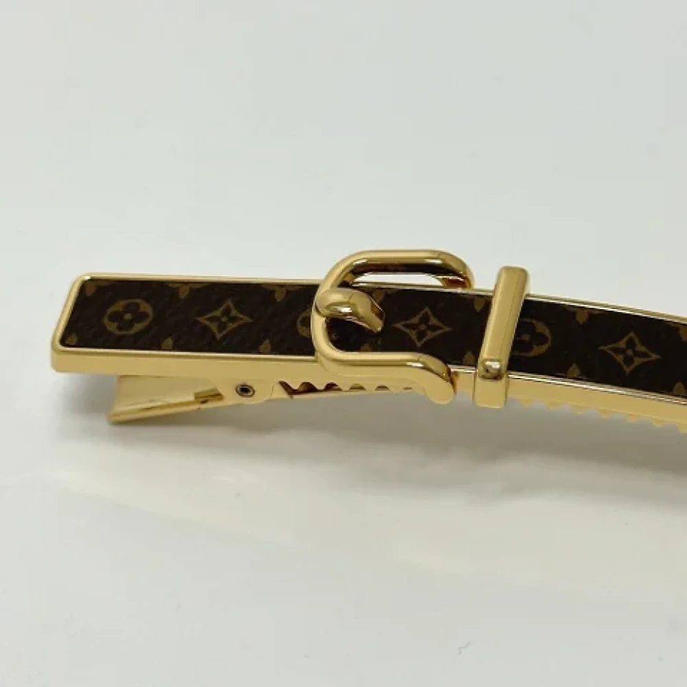 Louis Vuitton Vintage Pre-owned Metal hair-accessories Brown Dames