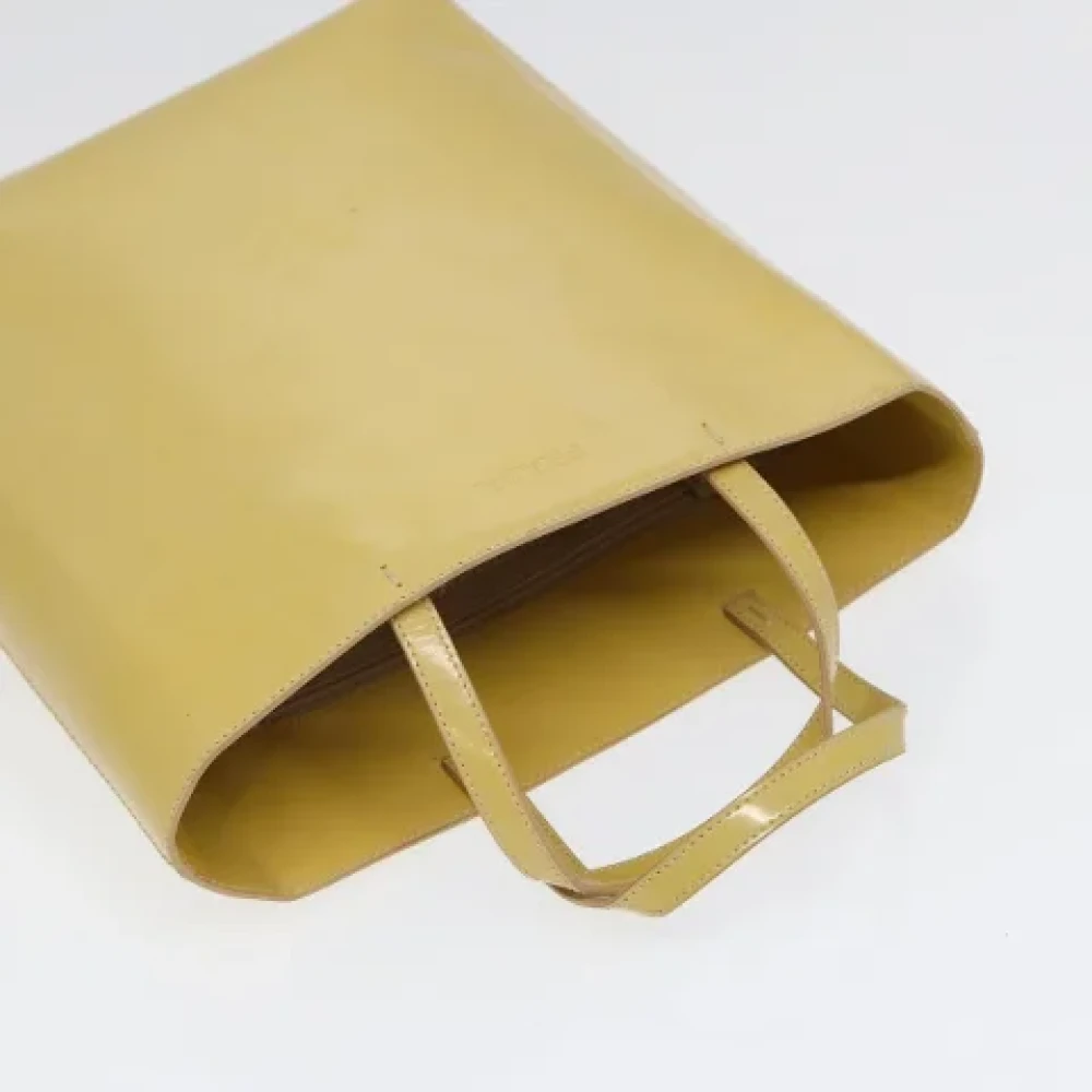Prada Vintage Pre-owned Coated canvas handbags Yellow Dames
