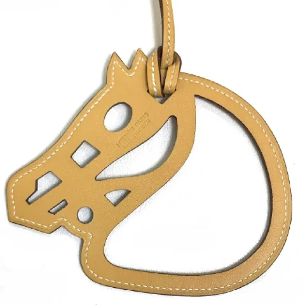Hermès Vintage Pre-owned Leather key-holders Beige Unisex