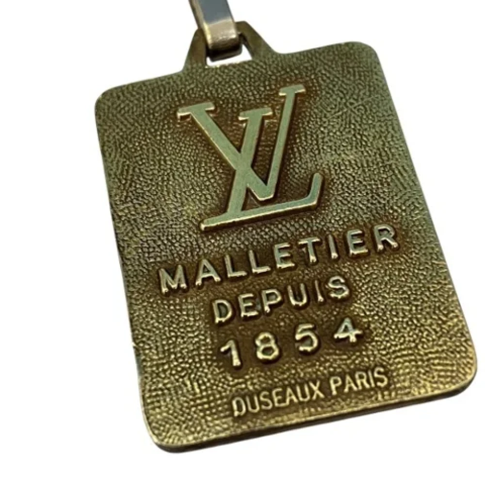 Louis Vuitton Vintage Pre-owned Metal key-holders Yellow Unisex