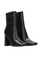 bottes-noires-en-similicuir-a-fermeture-eclair