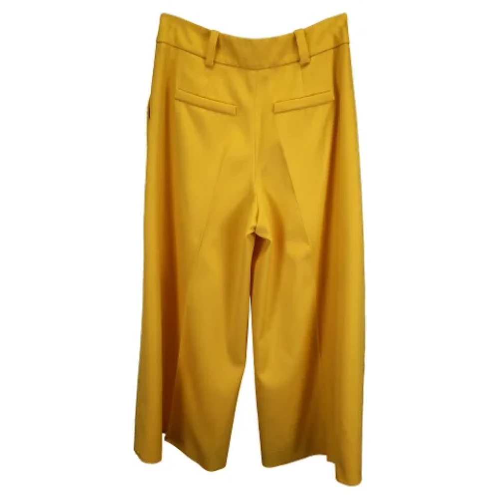 Oscar De La Renta Pre-owned Polyester bottoms Yellow Dames