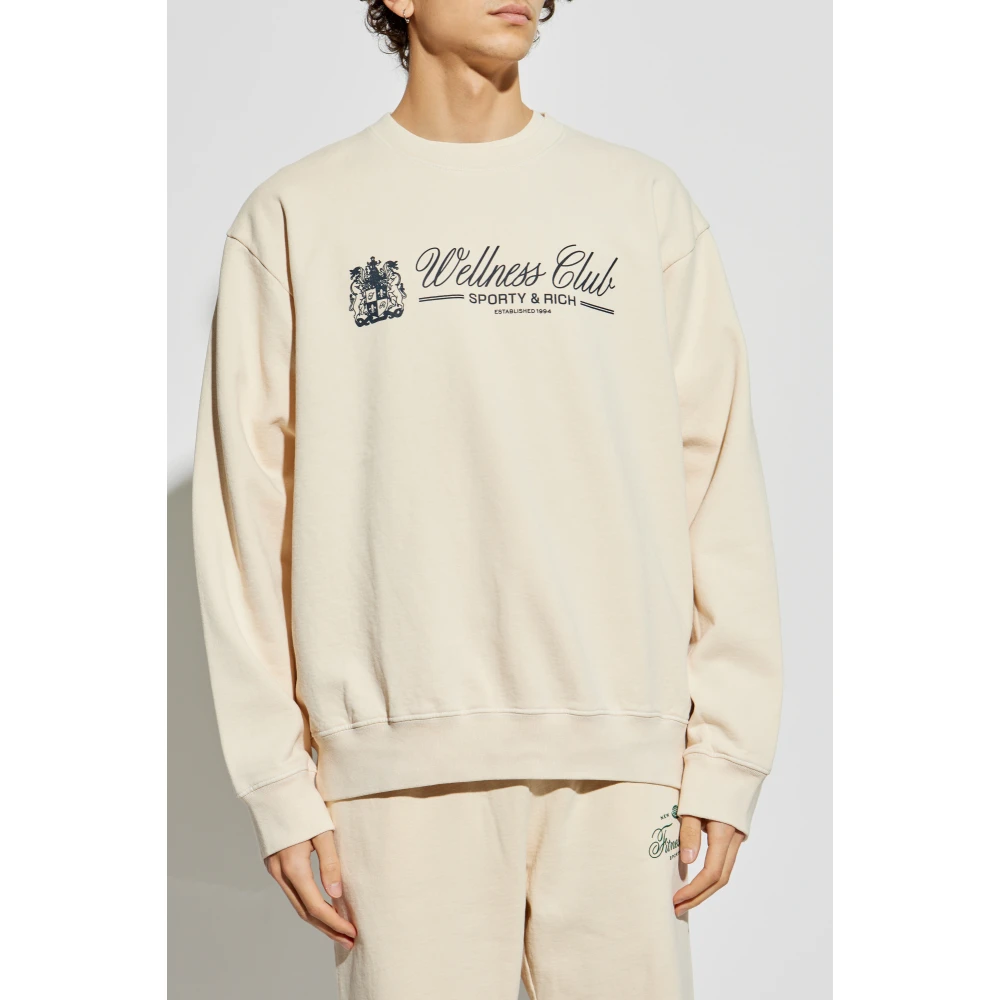Sporty & Rich Sweatshirt uit de Wellness Club collectie Beige Unisex