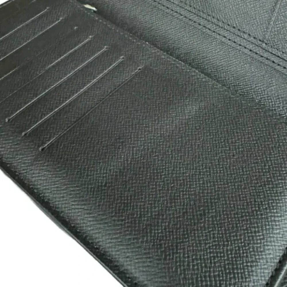 Louis Vuitton Vintage Pre-owned Leather wallets Black Heren