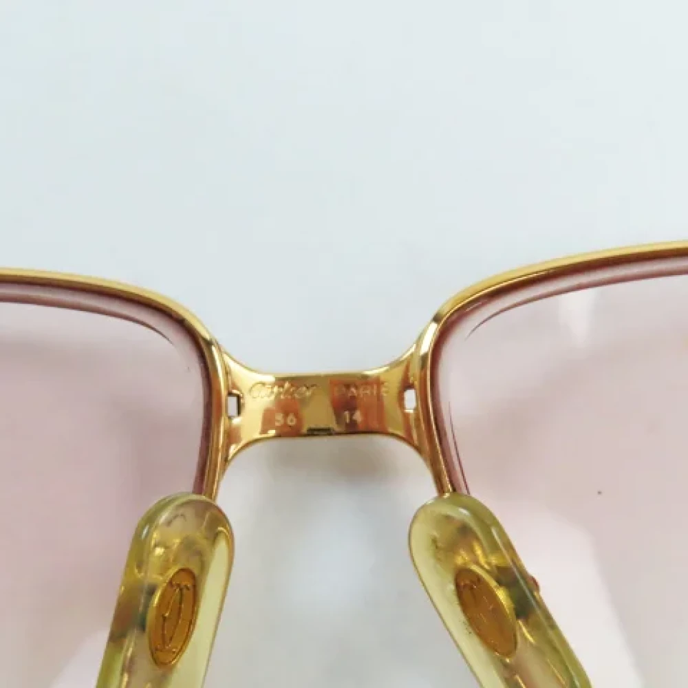 Cartier Vintage Pre-owned Metal sunglasses Yellow Heren