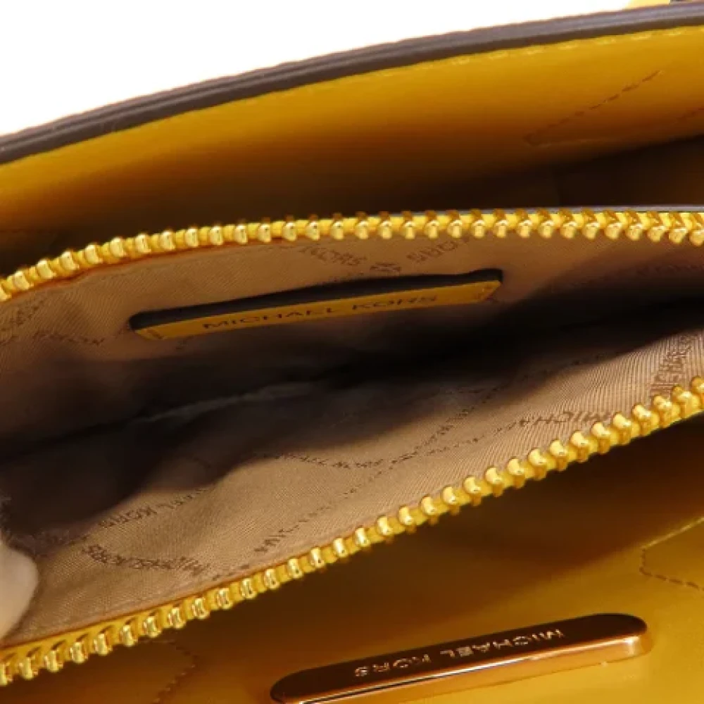 Michael Kors Pre-owned Fabric handbags Yellow Dames