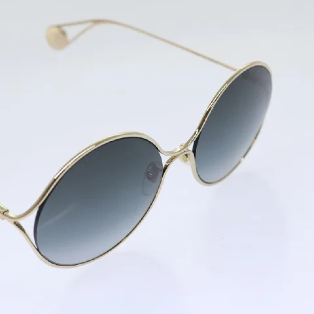 Gucci Vintage Pre-owned Metal sunglasses Yellow Dames