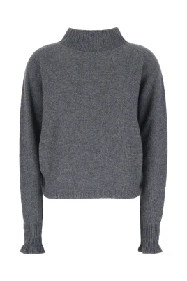Polo med metallisk logotyp