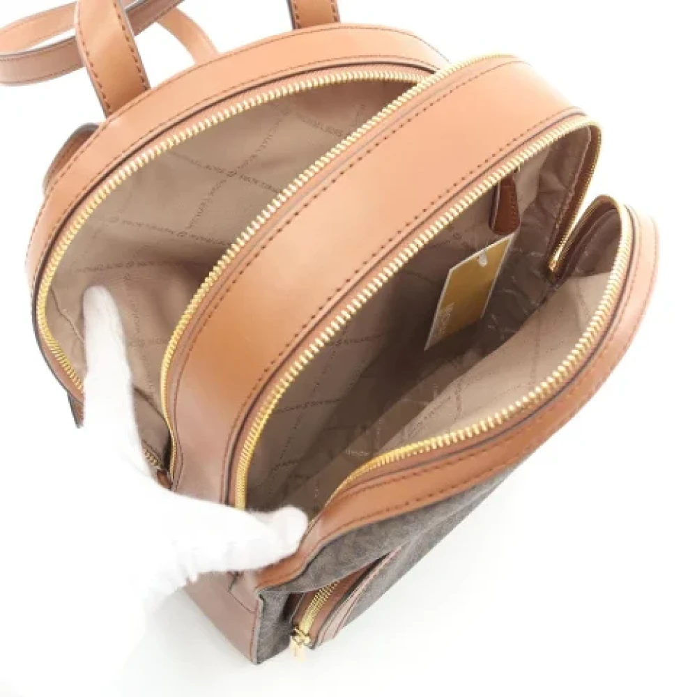Michael Kors Pre-owned Canvas backpacks Brown Dames