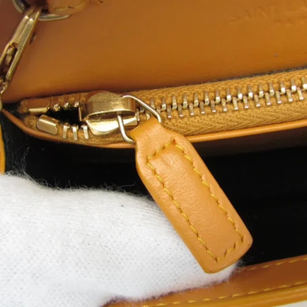 Yves Saint Laurent Vintage Pre-owned Leather wallets Orange Dames