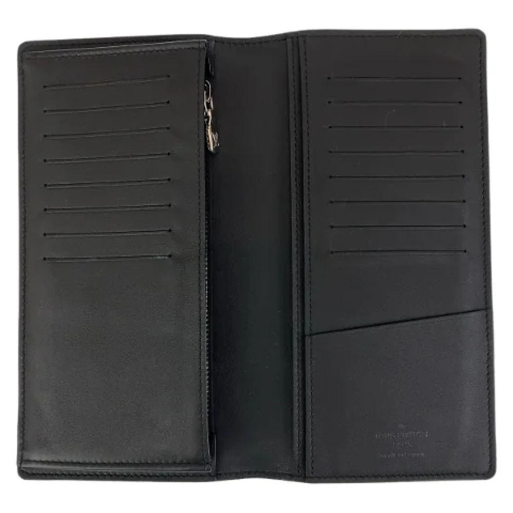 Louis Vuitton Vintage Pre-owned Leather wallets Blue Heren