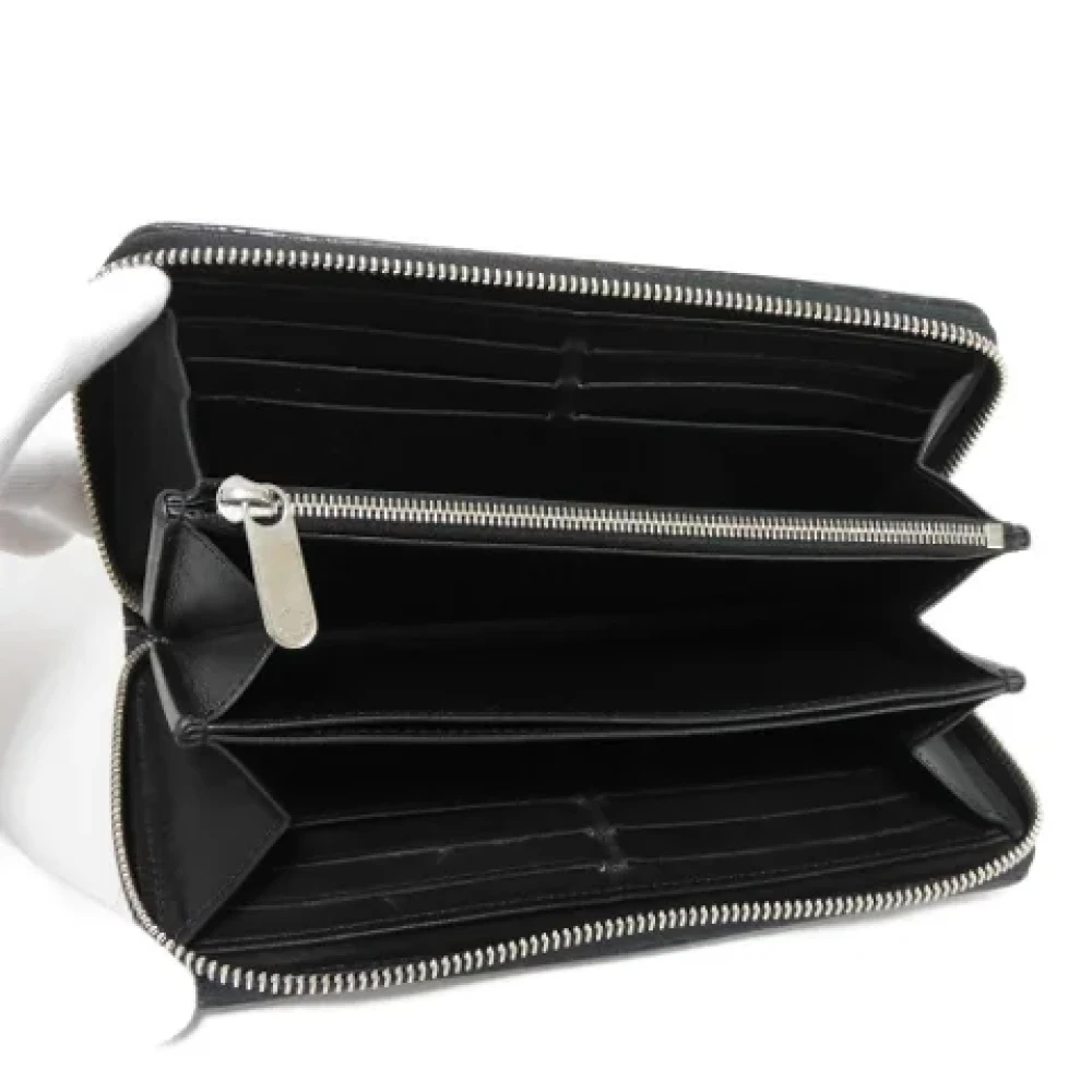 Louis Vuitton Vintage Pre-owned Leather wallets Black Dames