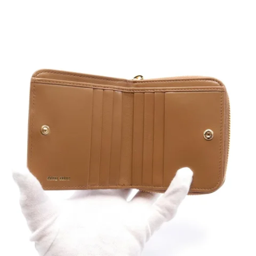 Miu Pre-owned Leather wallets Brown Dames