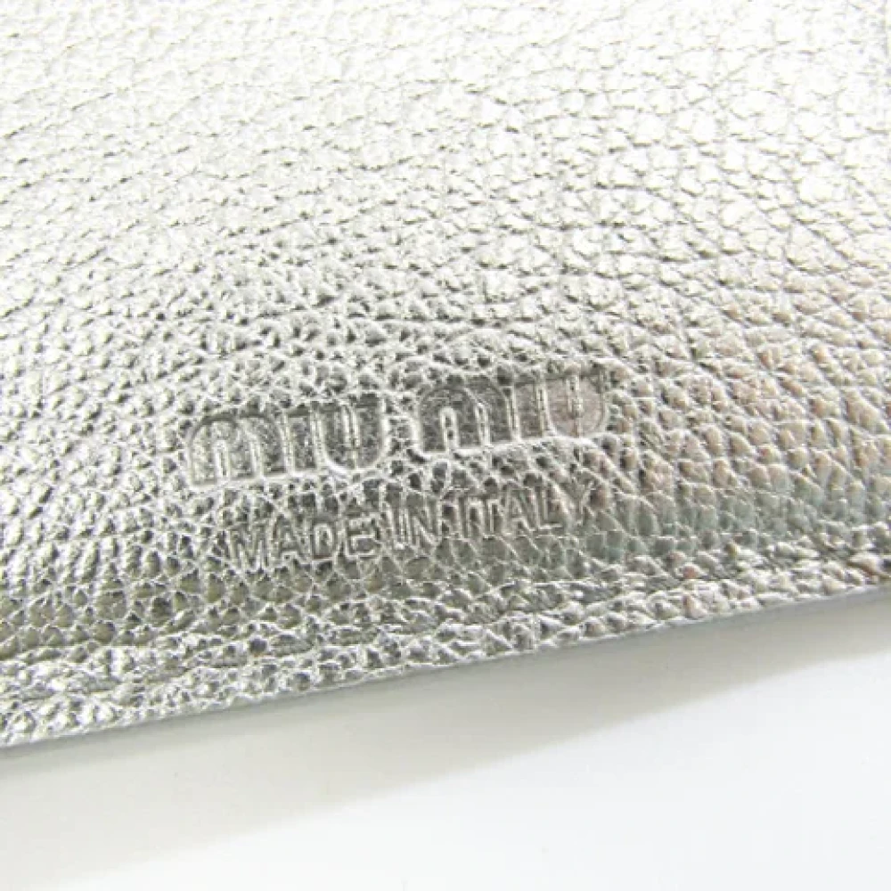 Miu Pre-owned Leather wallets Gray Dames