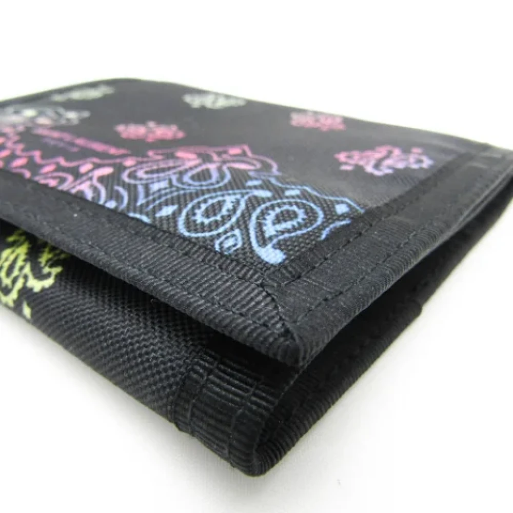 Yves Saint Laurent Vintage Pre-owned Nylon wallets Black Dames