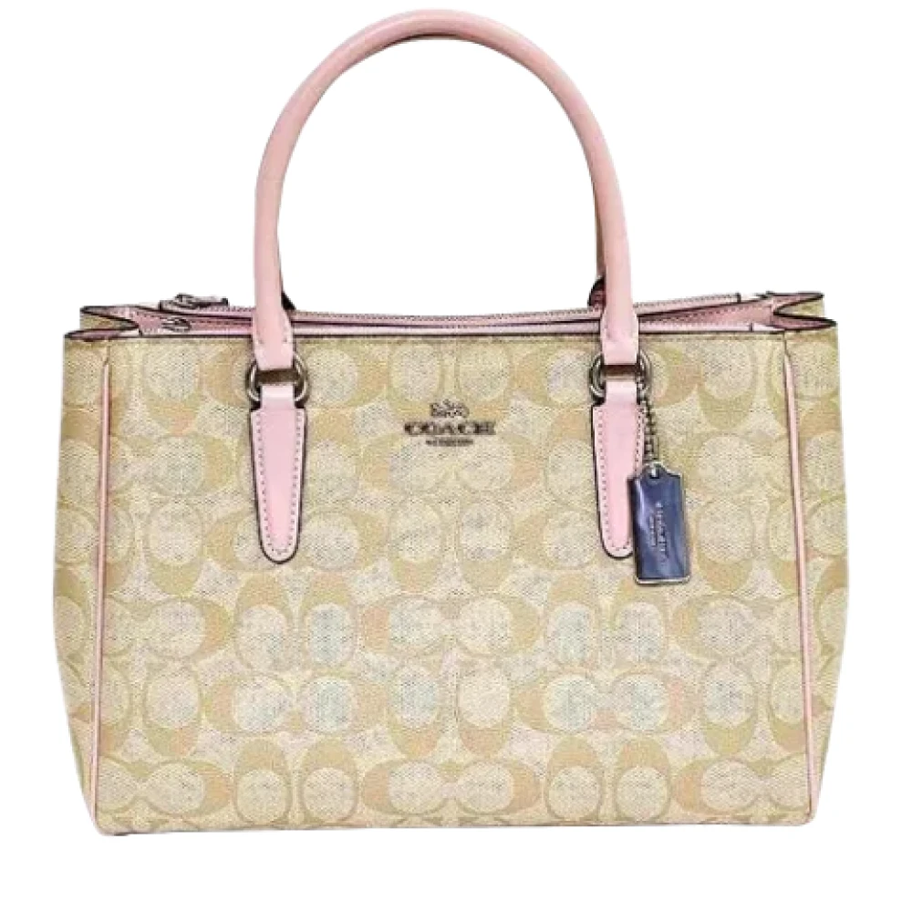 Coach Pre-owned Plastic handbags Beige Dames