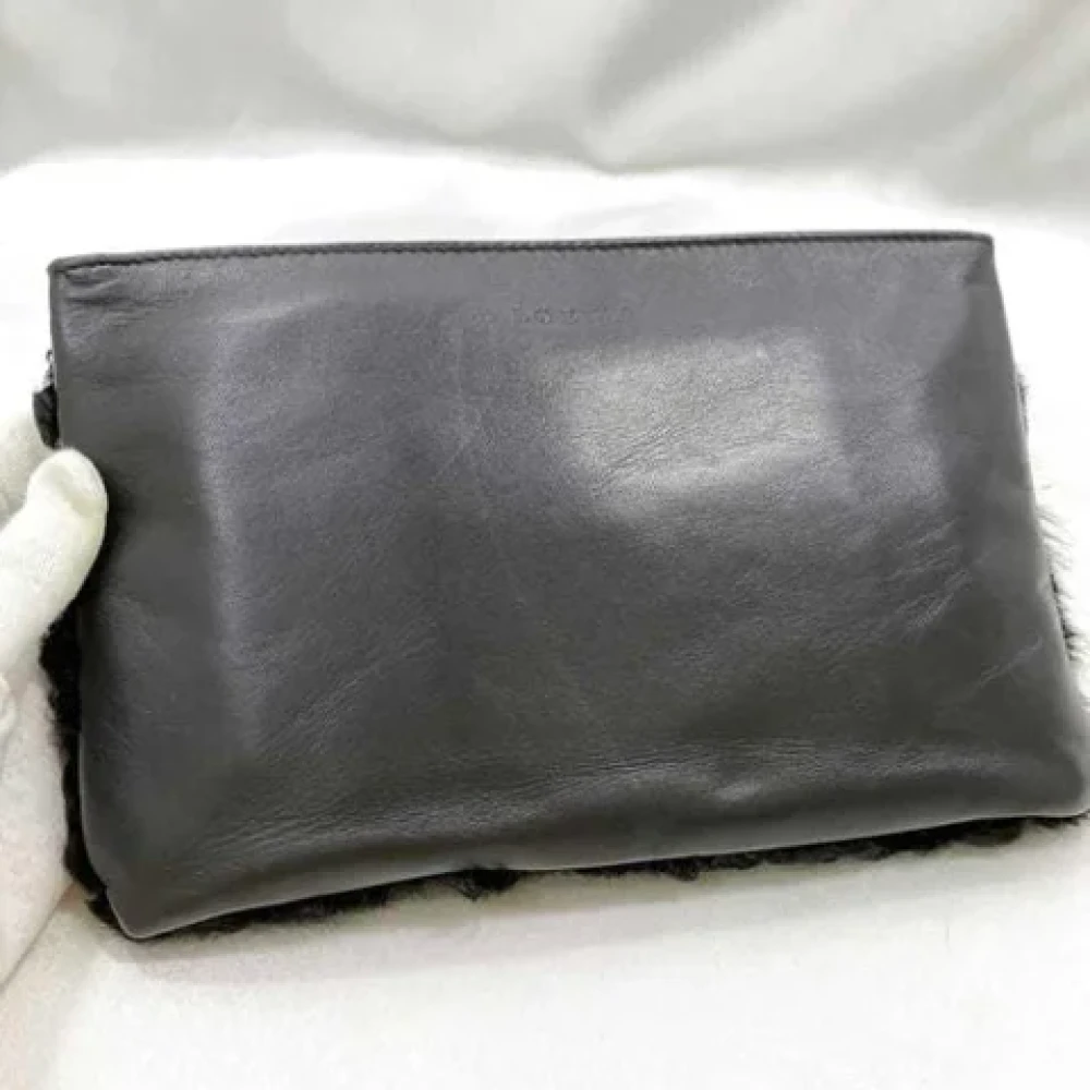 Loewe Pre-owned Leather pouches Black Dames