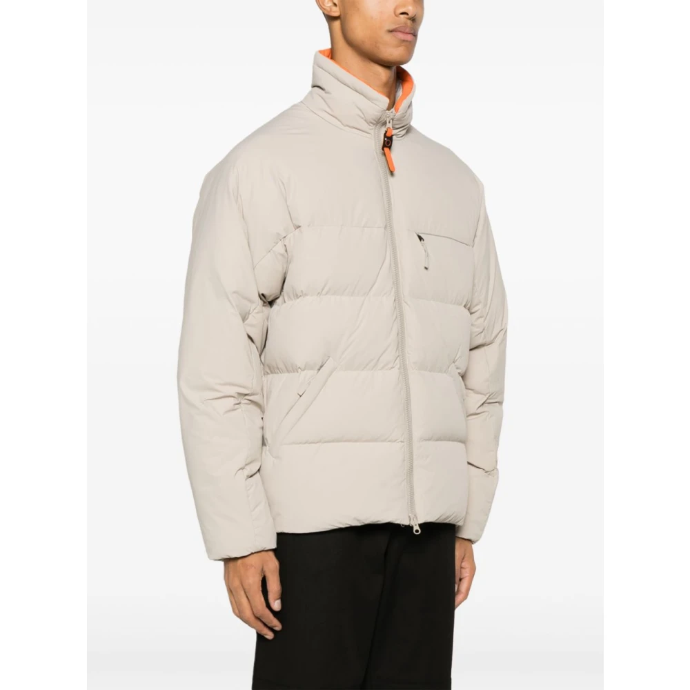 Junya Watanabe Gewatteerde Hoge Hals Rits Jas Beige Heren