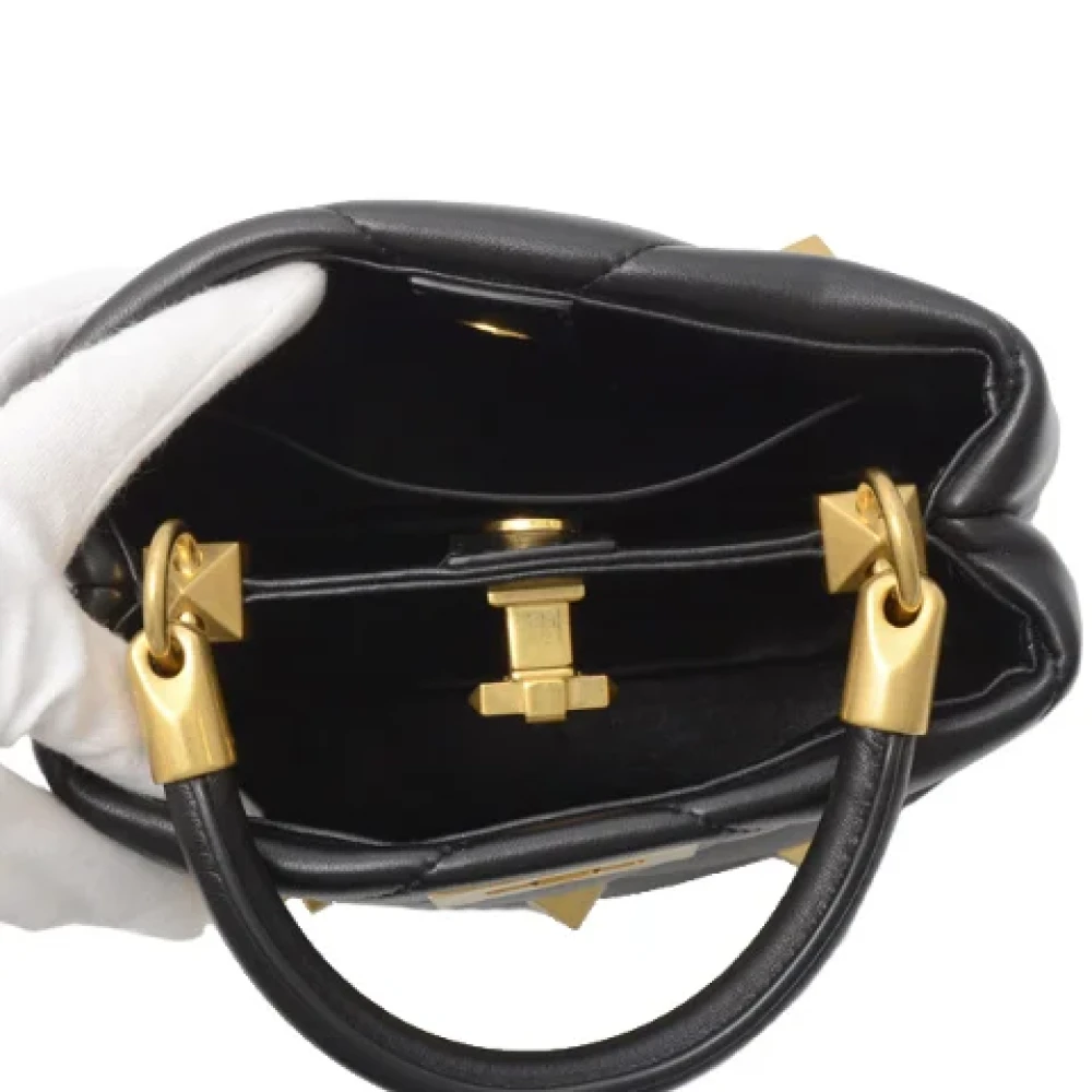 Valentino Vintage Pre-owned Fabric handbags Black Dames