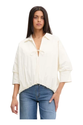 Blus med rosettdetalj och puffärm
