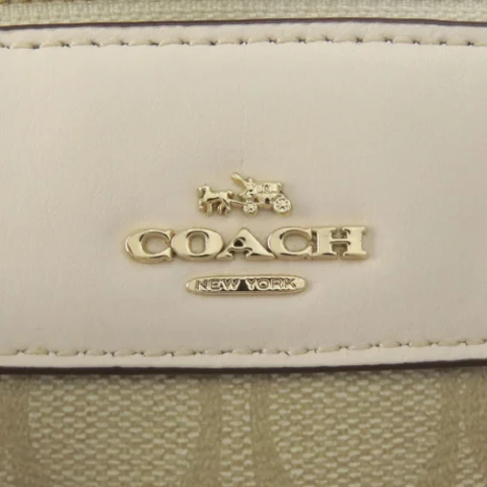 Coach Pre-owned Plastic handbags Beige Dames