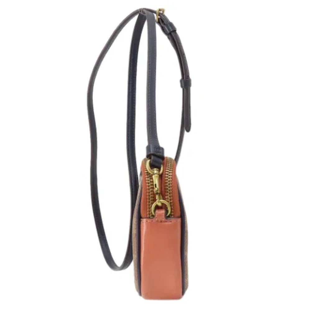 Coach Pre-owned Plastic shoulder-bags Brown Dames