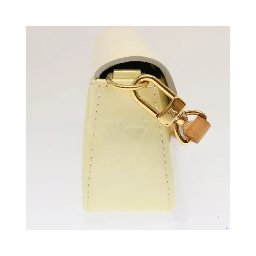 Louis Vuitton Vintage Pre-owned Leather clutches Yellow Dames