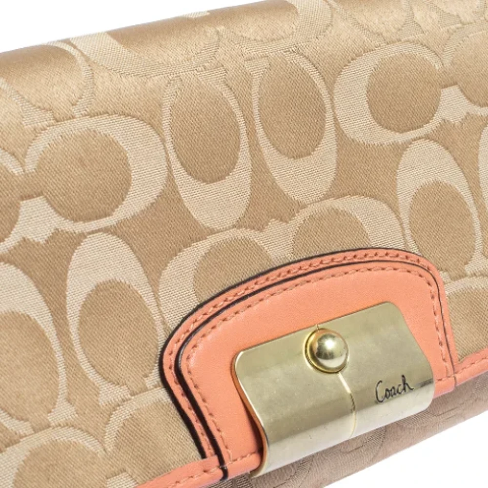 Coach Pre-owned Canvas clutches Beige Dames