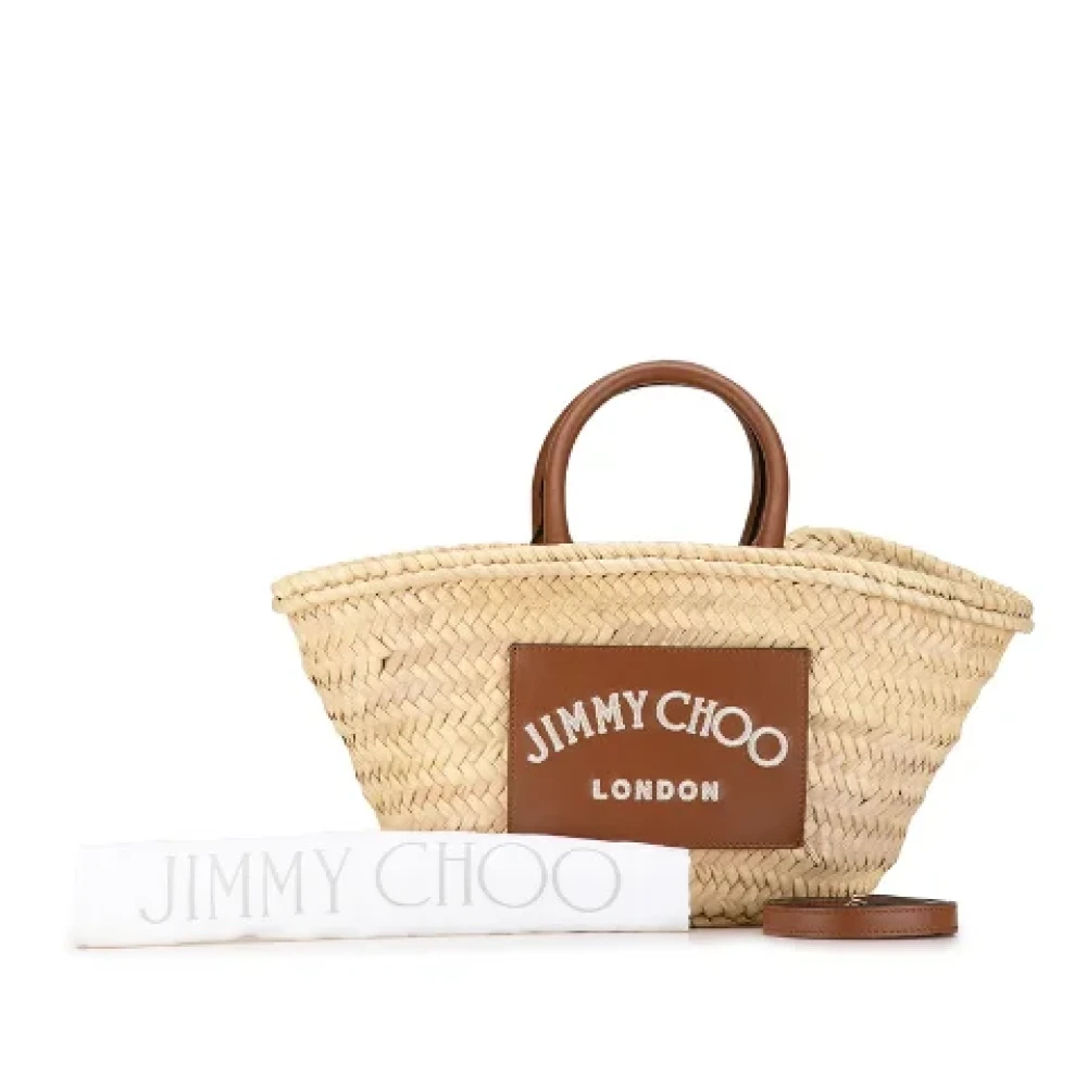 Jimmy Choo Pre-owned Fabric handbags Beige Dames