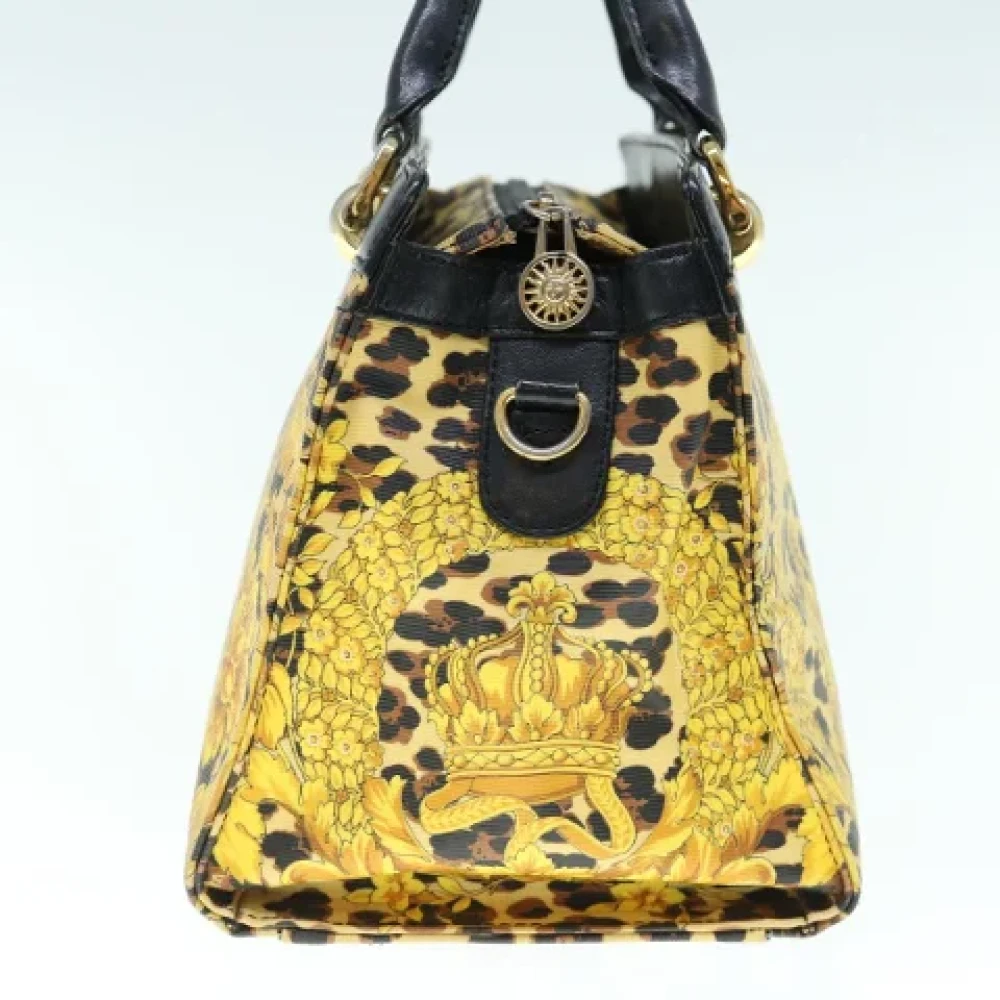Versace Pre-owned Canvas handbags Yellow Dames