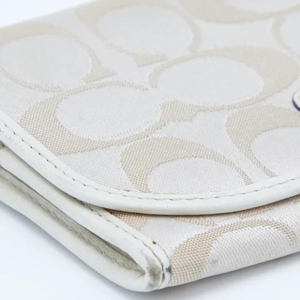 Coach Pre-owned Canvas wallets Beige Dames