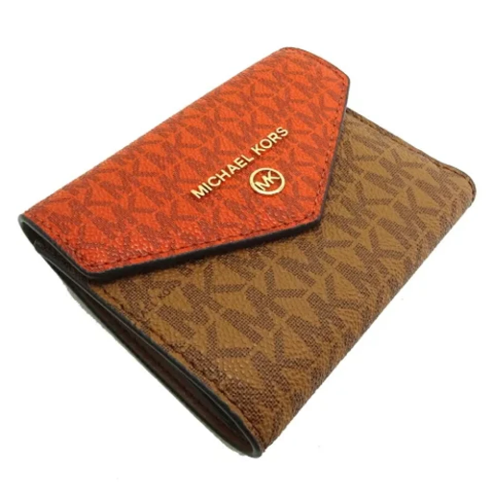 Michael Kors Pre-owned Canvas wallets Brown Dames